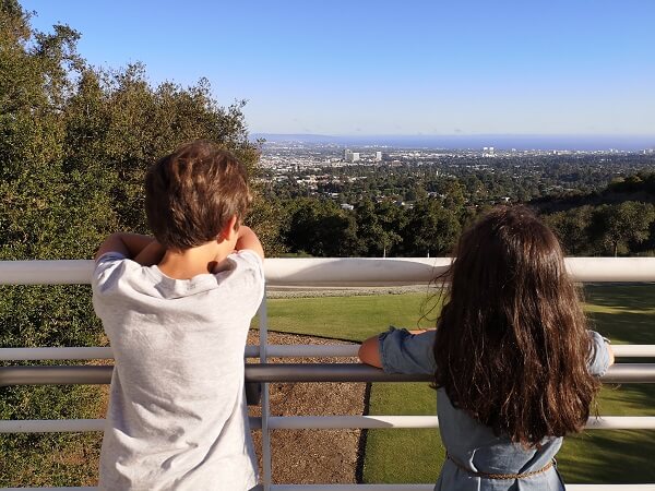 Kids looking at Los Angeles view from the Getty Centre terrace