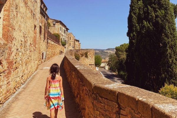 best family vacation destinations cover photo: child holidaying in italy