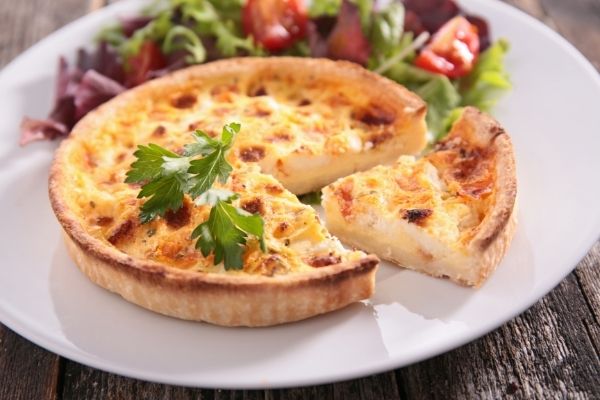 French quiche on white plate
