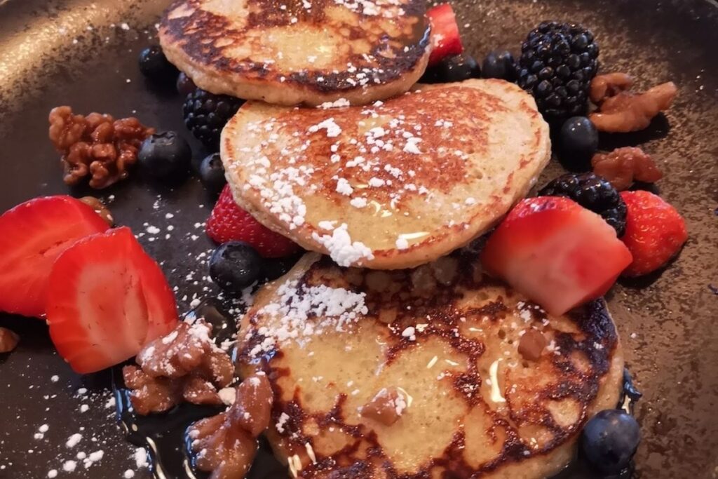 irish pancakes with berries walnuts honey and sugar