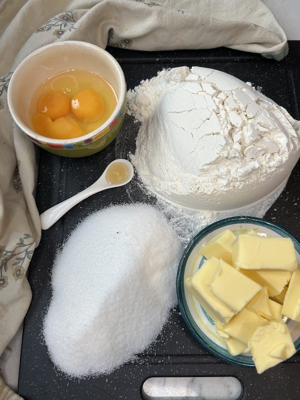 ingredients for my thumbprint cookies on a dark chopping board