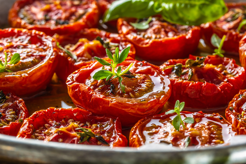 close up of roasted tomatoes (halved)