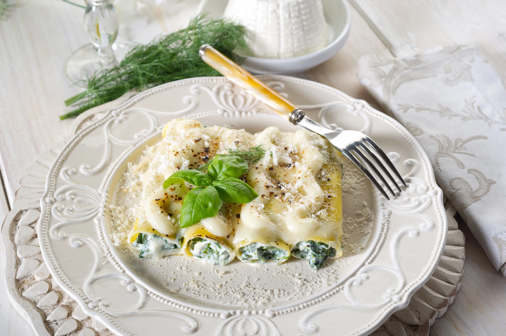 ricotta and spinach cannelloni on elegant white plate